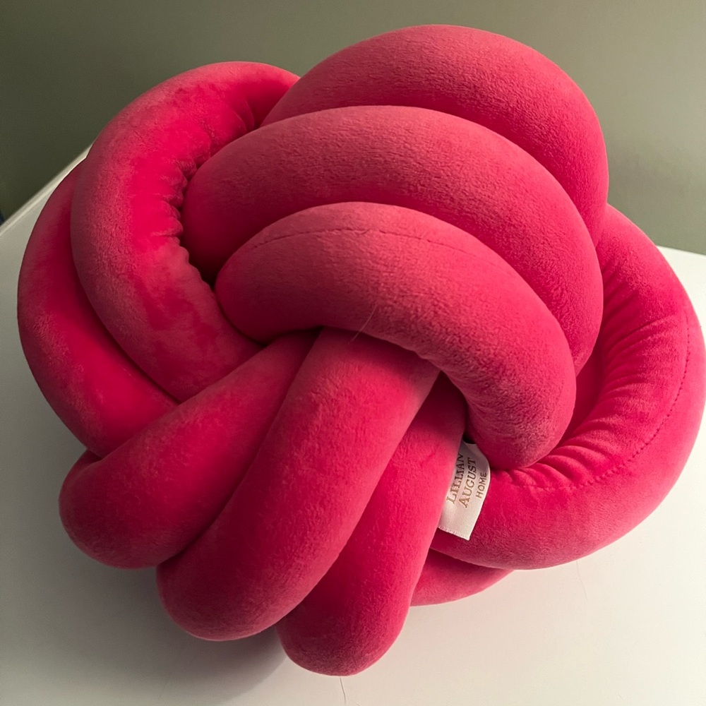 Hot pink Knot pillow by Lillian August Home
